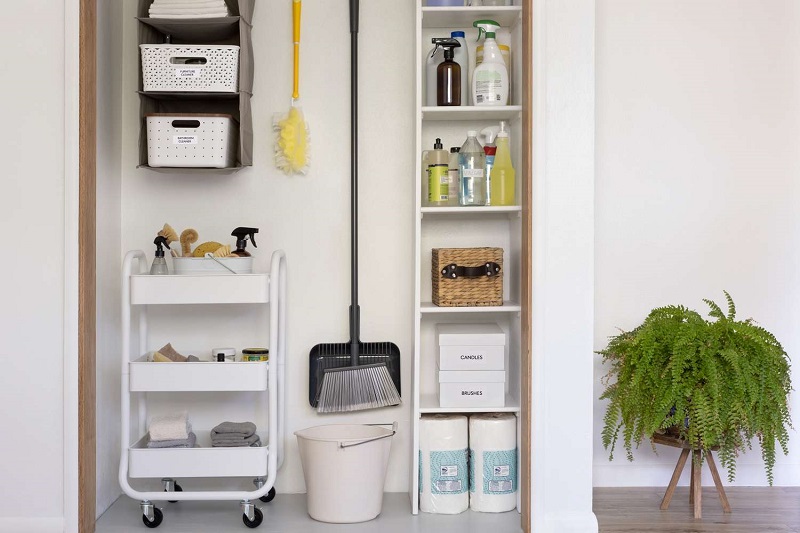 how to store brooms and mops without a closet