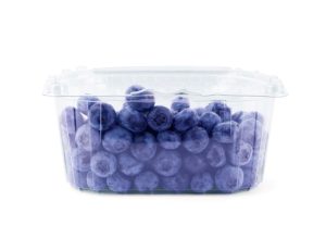 Fresh blueberries in clear plastic pint container showing typical 11-ounce weight variation