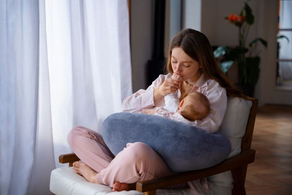 Mother selecting a soft nursing pillow for breastfeeding support